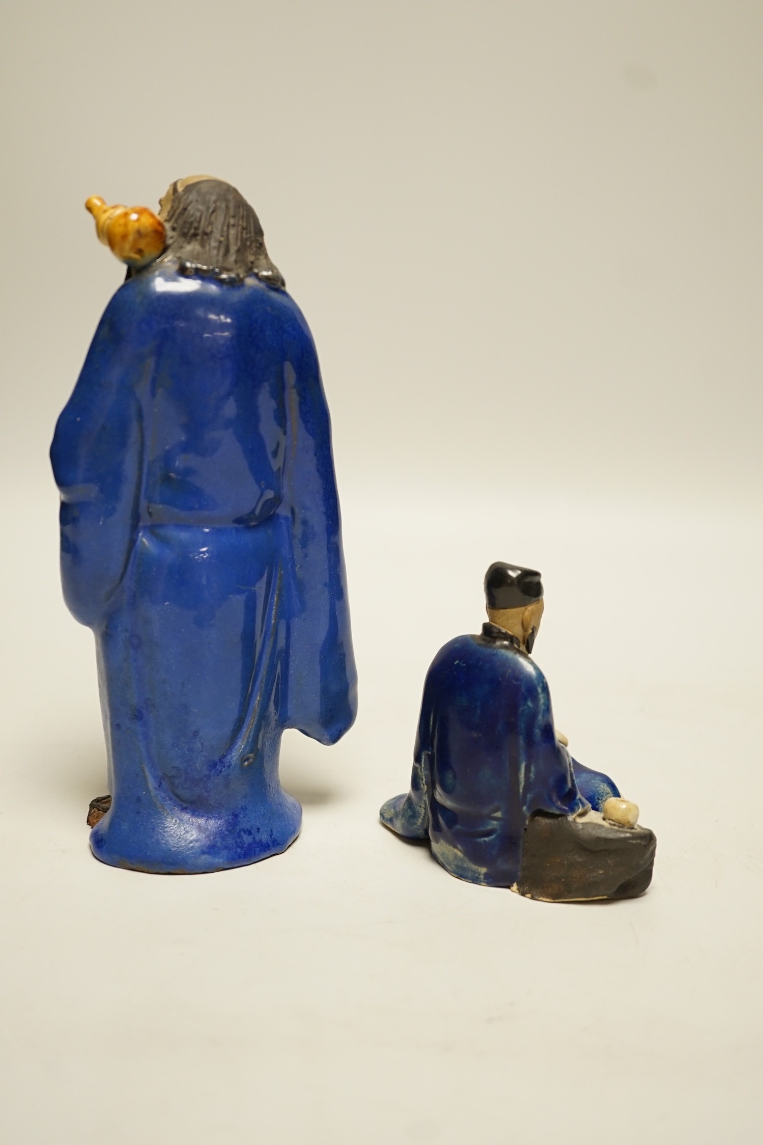 Two Chinese glazed pottery figures of Li Tieguai and Lu Dongbin, late 19th/early 20th century, largest 18cm